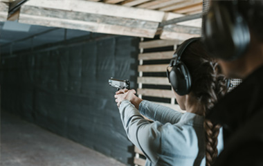 Woman shooting a target